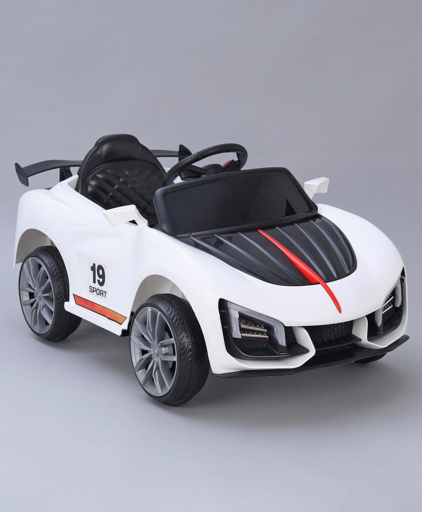 White battery operated ride on car for kids near me Gujarat with sporty design and black seat