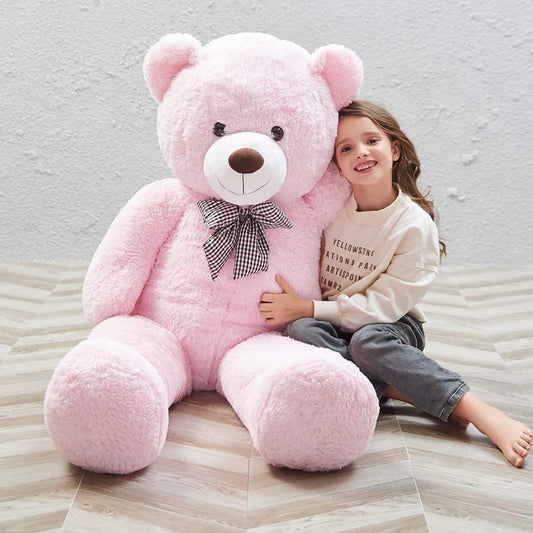 Big size soft plush teddy for girls Ahmedabad Gujarat India shown with smiling girl hugging large pink teddy bear