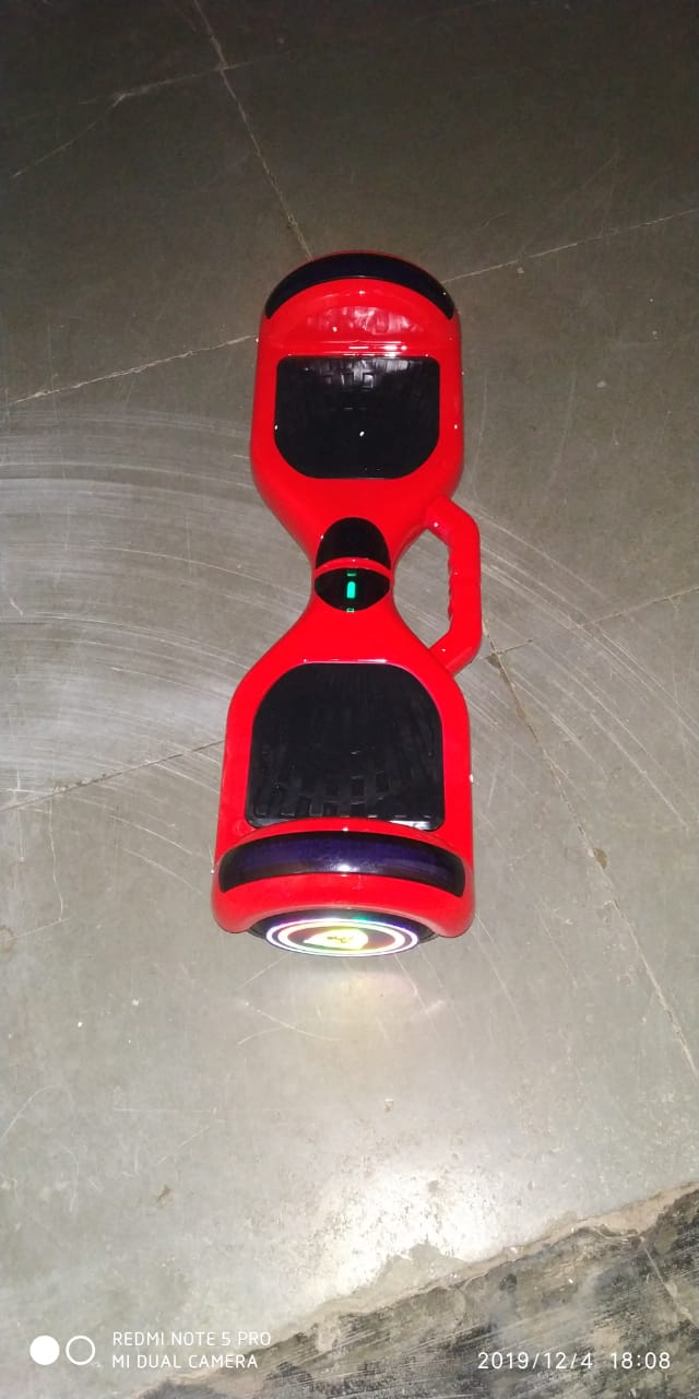 Red Bluetooth hoverboard for children on floor buy bluetooth hoverboard for children Ahmedabad Gujarat online