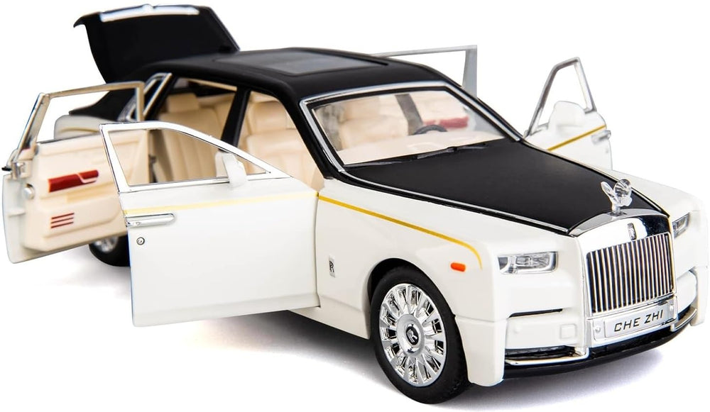 Rolls Royce Phantom diecast model car with lights and music. White and black toy with open doors and beige interior