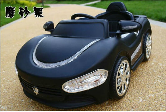 Children battery operated car with stroller at Sam's Toy World Ahmedabad featuring sleek design and shiny wheels