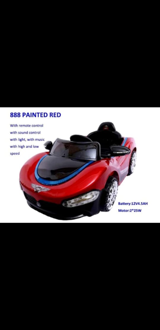 Red battery operated car with remote control, light, and music for kids at Sam's Toy World Ahmedabad