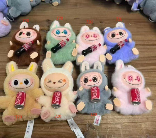Coke Labubu doll vinyl mystery box online Ahmedabad India with eight plush collectible dolls holding mini Coca-Cola cans