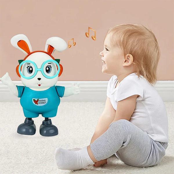 Gift toy bunny with music and lights dance toy Online playing next to smiling toddler on carpet