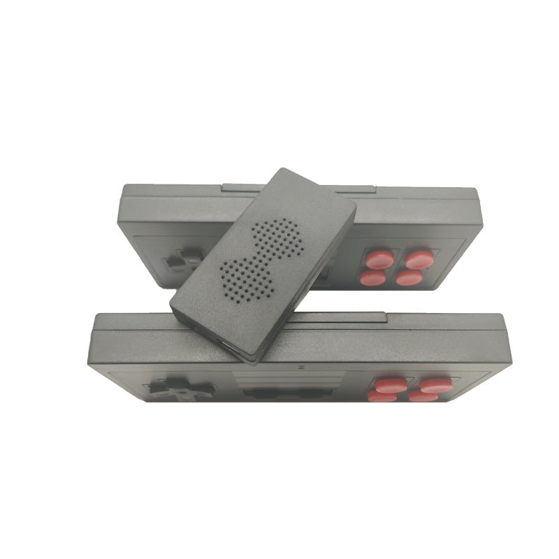 Retro gray rectangular wireless controller TV video game with dual D pads and red action buttons