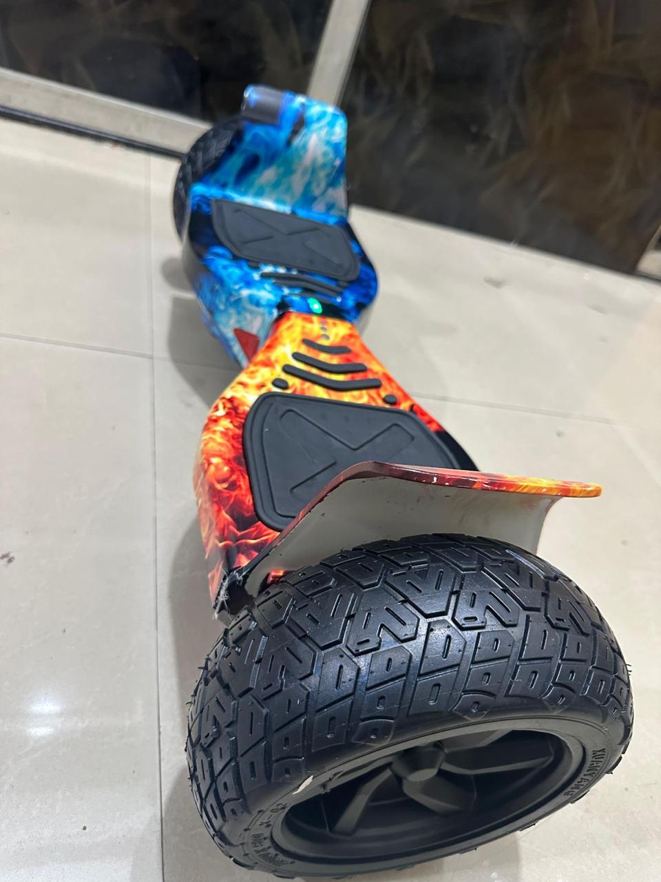 Colorful hoverboard off-road in Ahmedabad Gujarat with large tires, side view, perfect for outdoor adventures