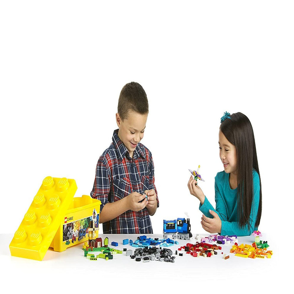 Children with colorful LEGO pieces and yellow box LEGO Classic Creative Brick Box 10696 Ahmedabad Gujarat online India .