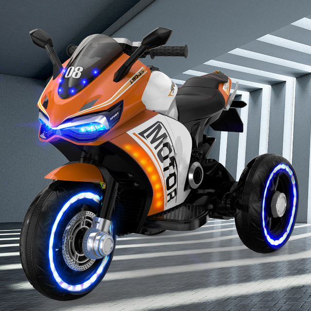Orange and white sport electric trike with LED wheels and headlights battery operated ride on bike for children