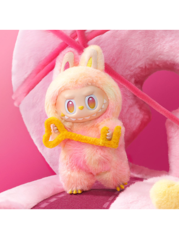 Official authentic Pop Mart India labubu doll online pink fuzzy character holding a yellow key toy