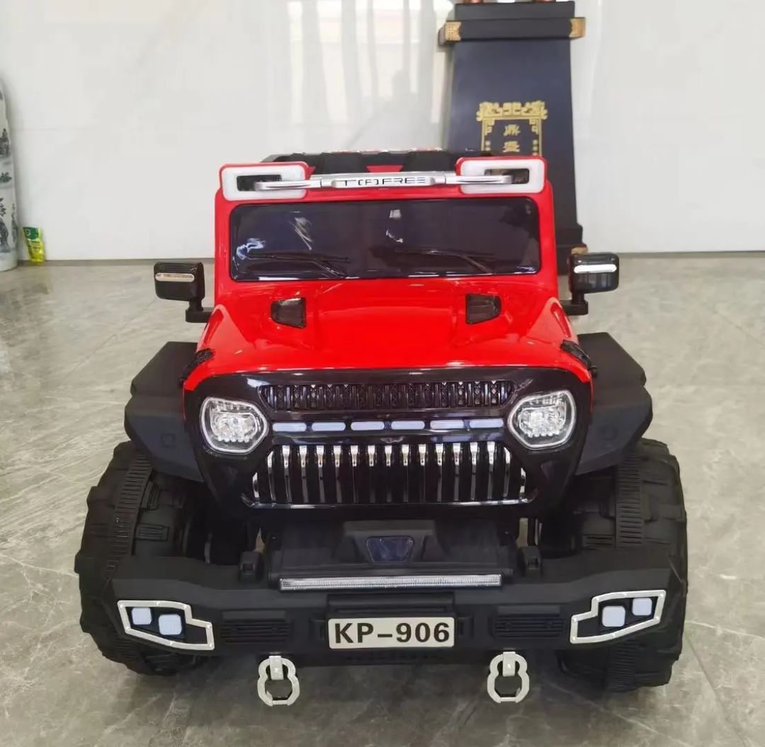 Red heavy duty 4x4 ride-on kp 906 Make in Ahmedabad Gujarat toy vehicle with rugged tires
