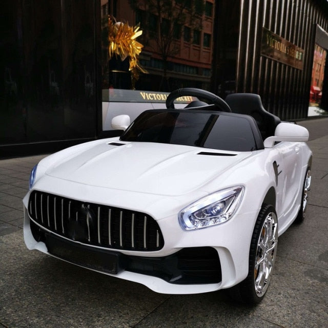 White remote control kids car 1-8 years with realistic design and black interior seat