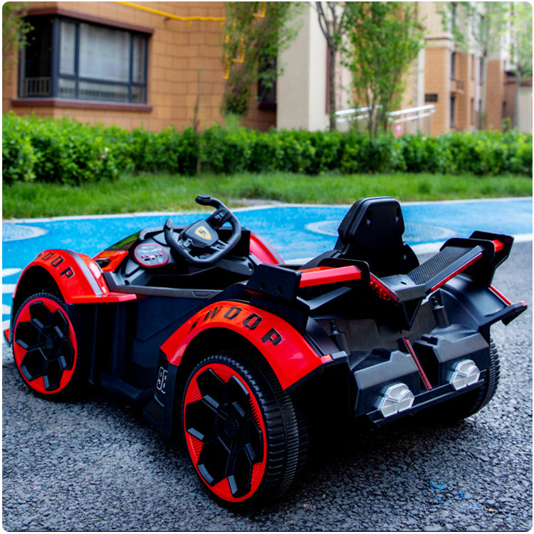Red and black remote control sports car toy for children in Ahmedabad Gujarat India on outdoor pavement