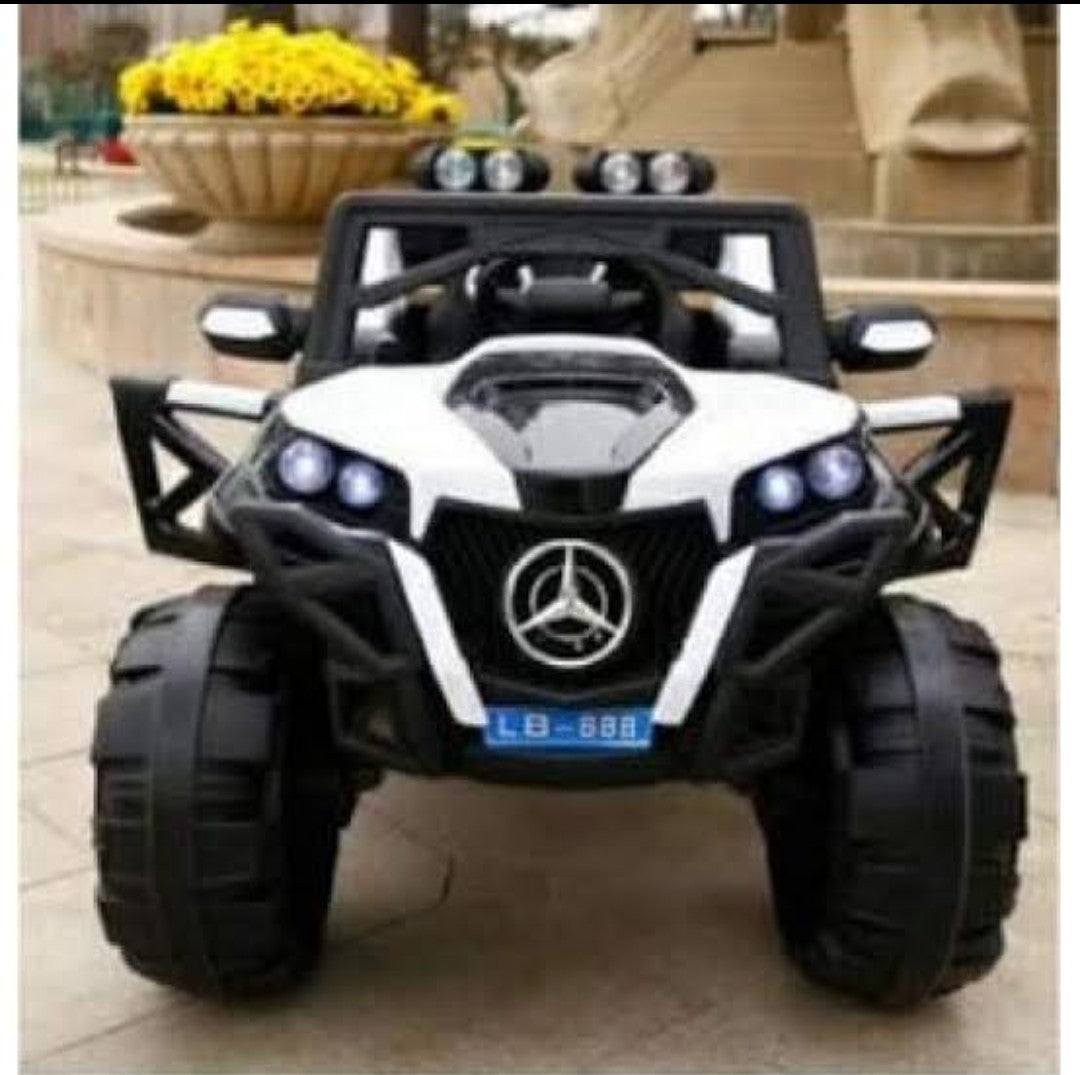 Ride on Toy Off-road Vehicle Ahmedabad Gujarat in black and white with large tires and bright headlights