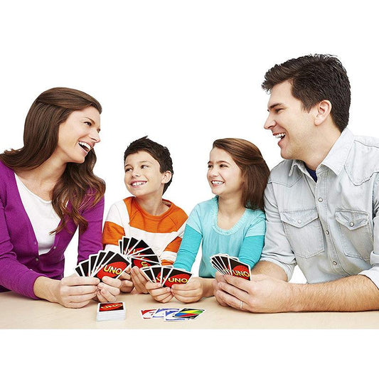 Family playing Uno cards board game together with best price Uno cards Ahmedabad Sam's Toy World shop