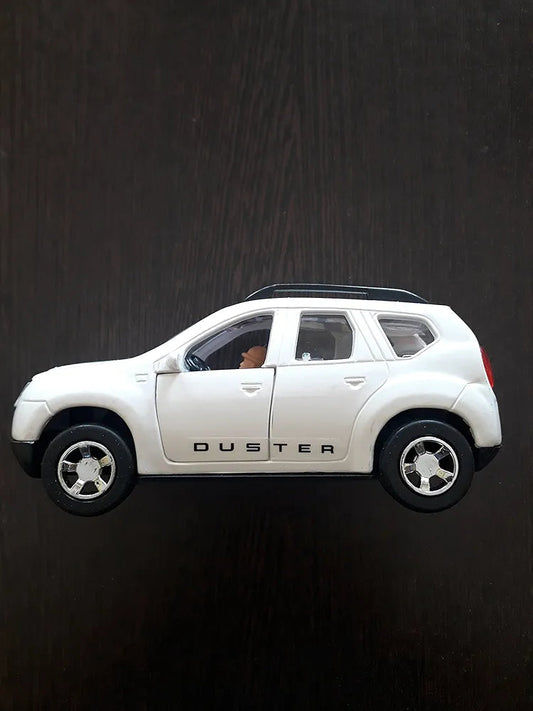 White Renault Duster diecast model car side view on dark background diecast vehicle toy showpiece Sam's Toy World Ahmedabad shop