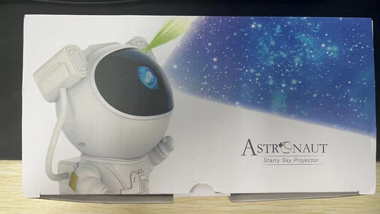 Astronaut starry sky projector packaging featuring a cartoon astronaut, perfect for creating a galaxy projector by Sam's Toy World Ahmedabad