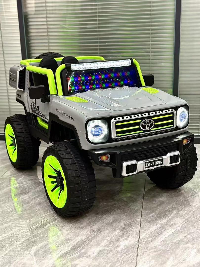 Luxury battery Operated Ride-On Car for Children Ahmedabad in grey and neon green with large wheels and headlights