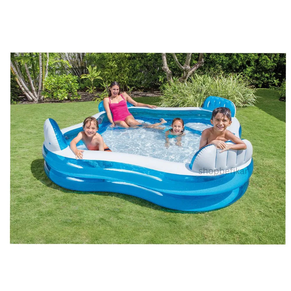 Intex inflatable swimming pool for adults and kids with built in seats and family playing on backyard lawn