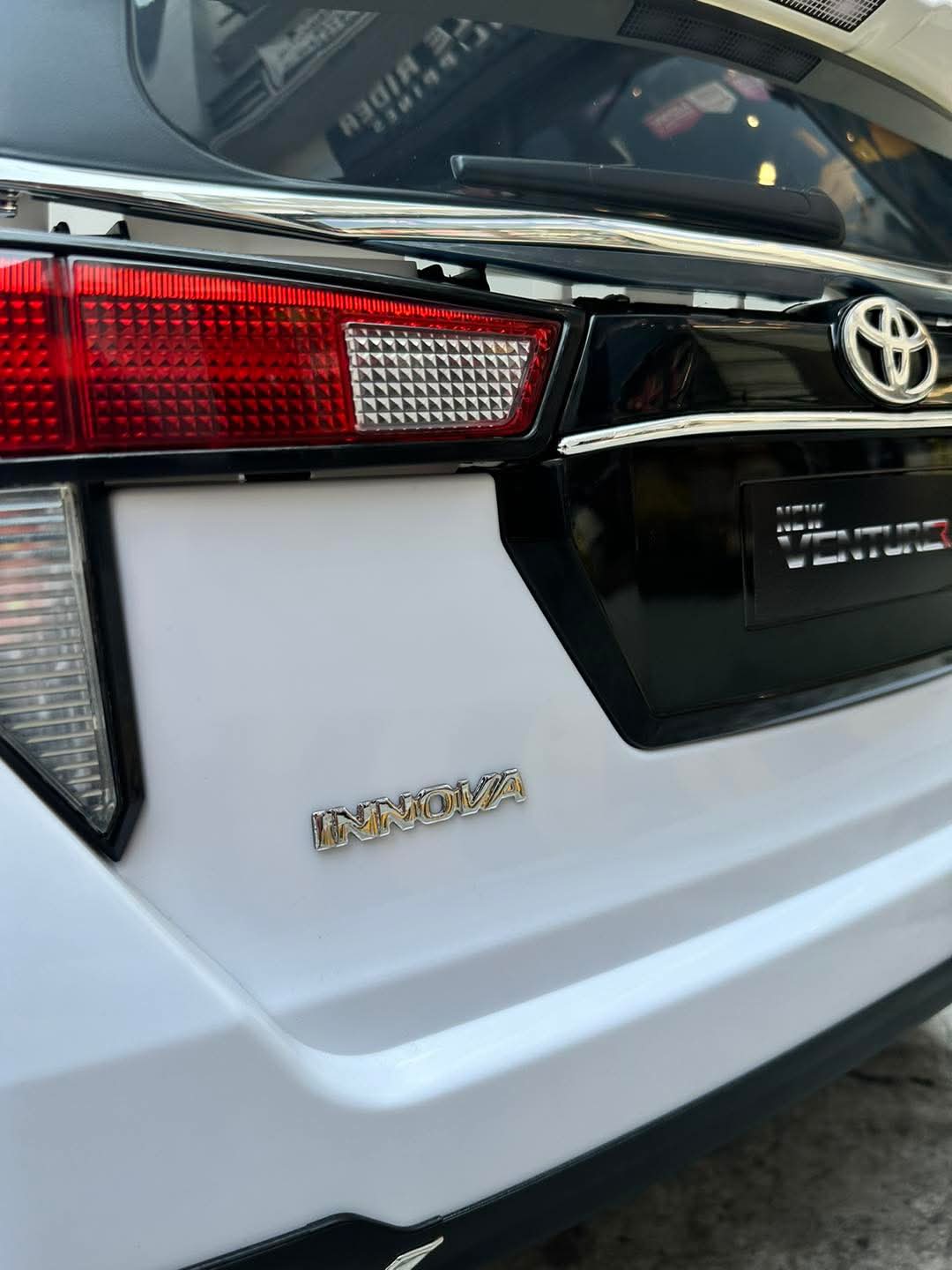 Close-up of the rear emblem on a 2026 Toyota Innova battery operated ride-on car with sleek design