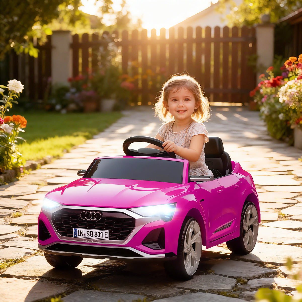 Audi Q8 E-tron Sportback Licensed 12V Ride On Car W Remote, 4 Spring Suspension Wheels, Headlights, Music, Horn - Pink