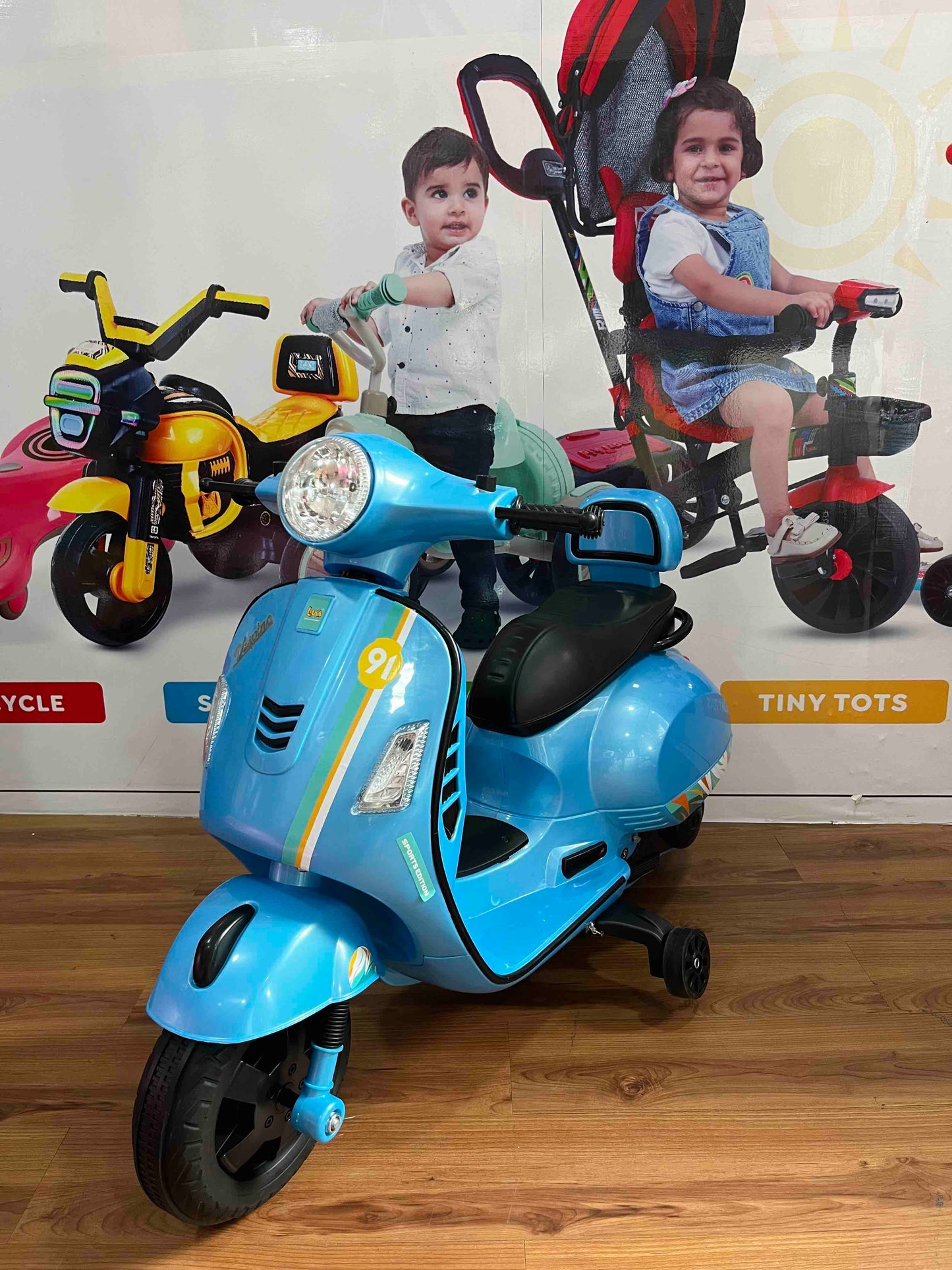 Buy Luusa Vespa Scooter for Kids | Made in India | Sams Toy World | Best Shop In Ahmedabad samstoy.in Sams toy world shop in Ahmedabad Gujarat 