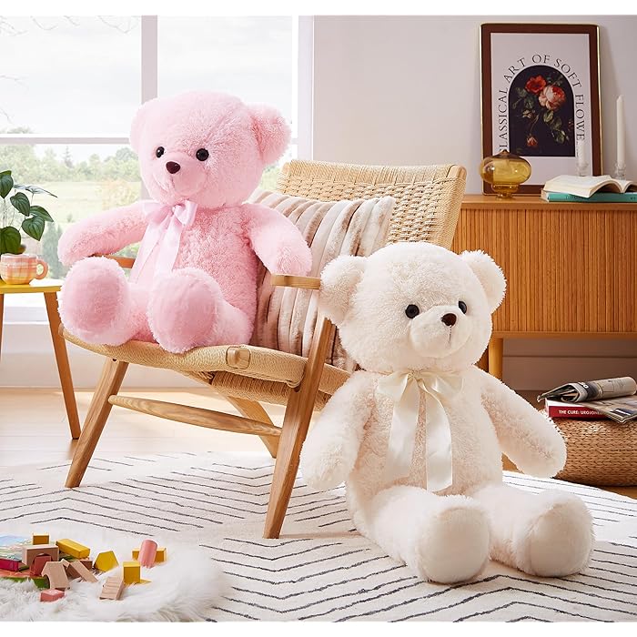 Pink and white plush teddy bears on chair and floor large teddy bear for birthday for Girl in Ahmedabad Gujarat online India .