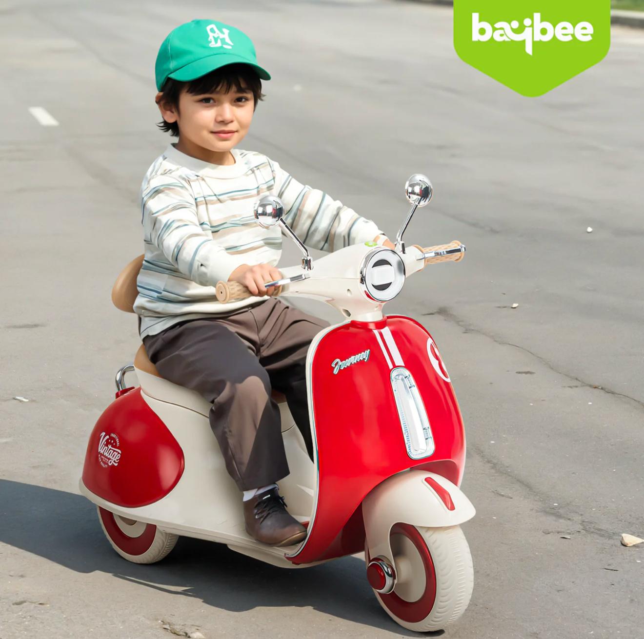 Red electric scooter for kids at Sam's Toy World Ahmedabad, side view, perfect for outdoor fun and play.