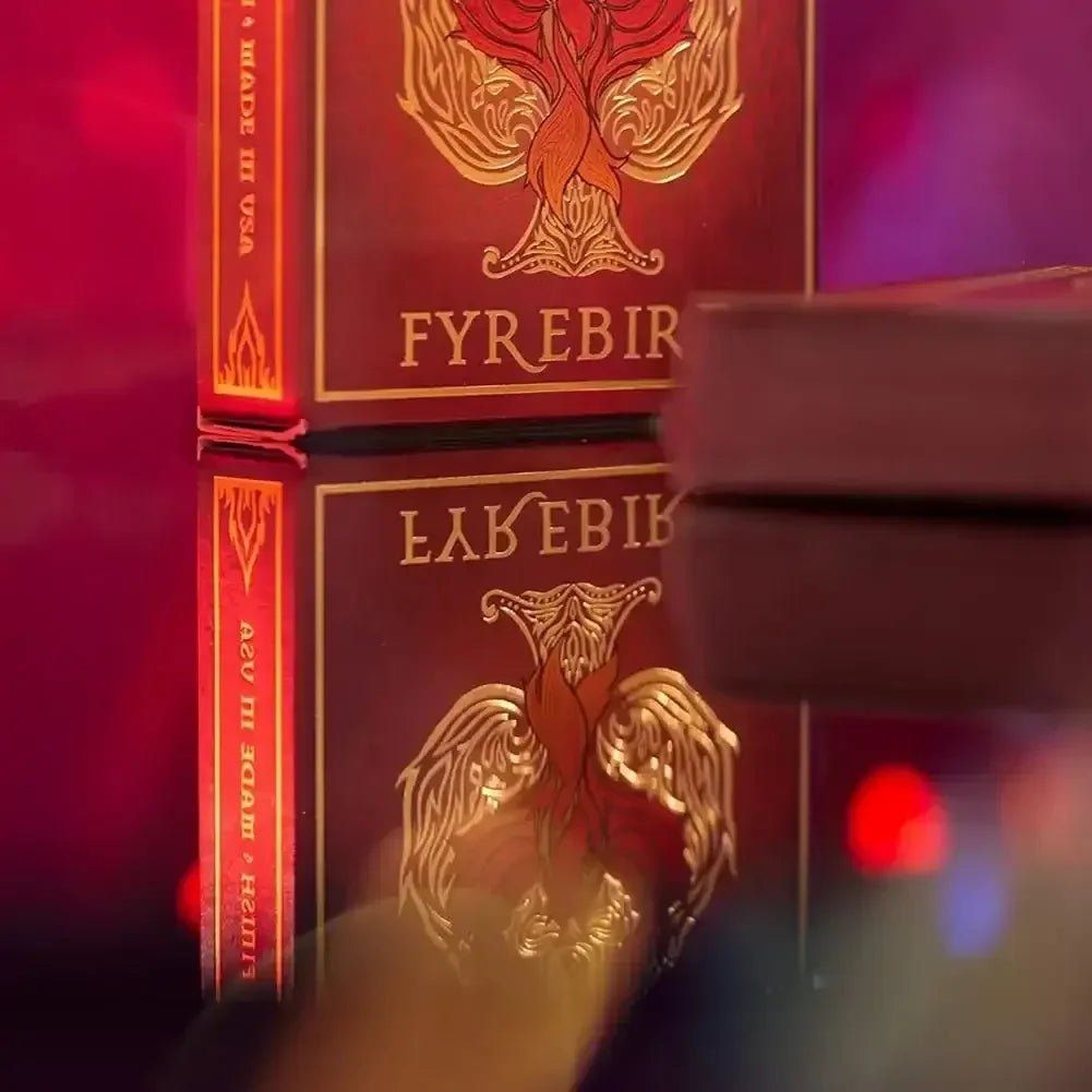 Fyrebird playing cards box with intricate red design, showcasing games in playing cards for family fun