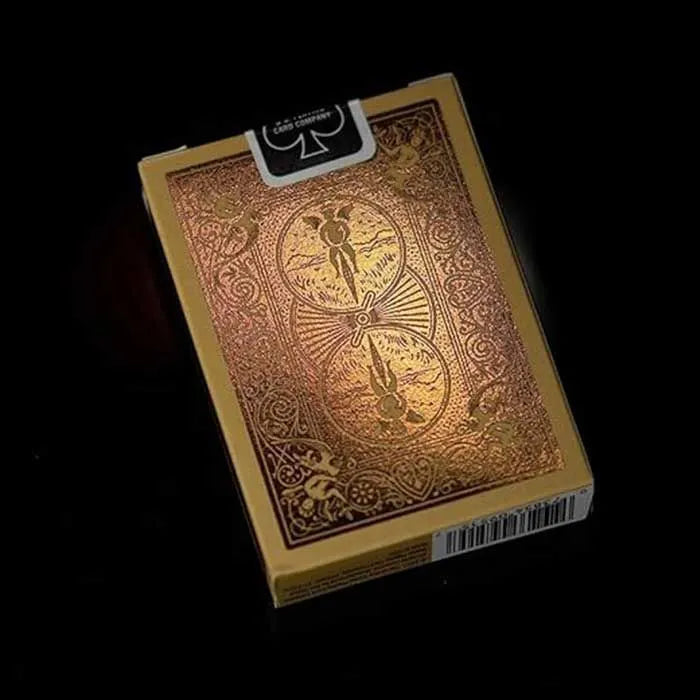 Gold Bicycle playing cards with intricate design, front view, perfect for card games and magic tricks