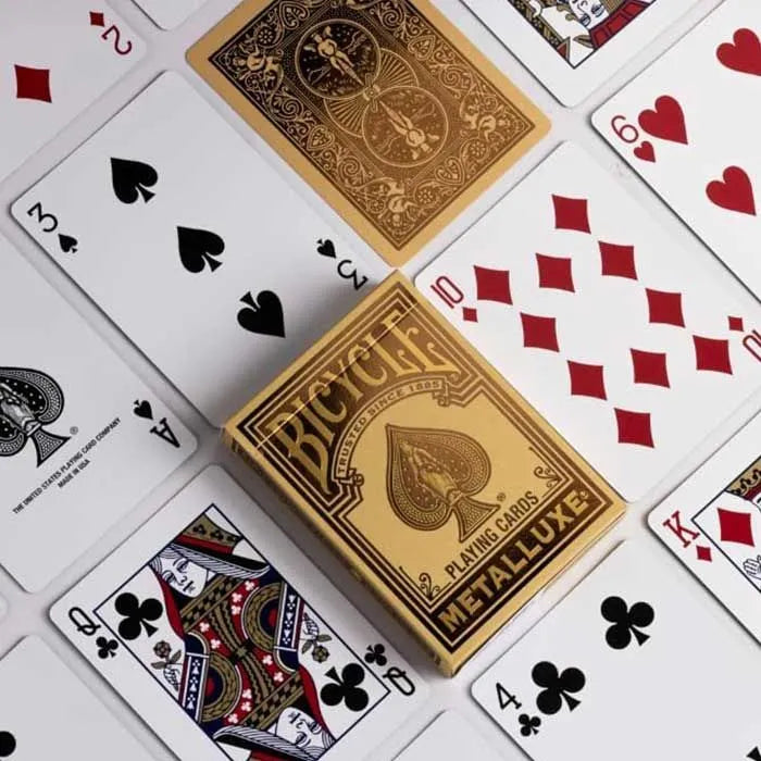 Bicycle playing cards in a gold box, top view, suitable for card games and magic tricks