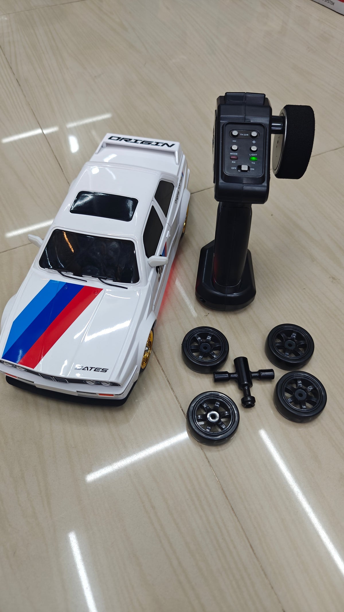 BMW DRIFT CAR 30KM HIGH SPEED E30 HOBBY GRADE M3 in white with remote, suitable for kids aged 8 and up, from Sam's Toy World