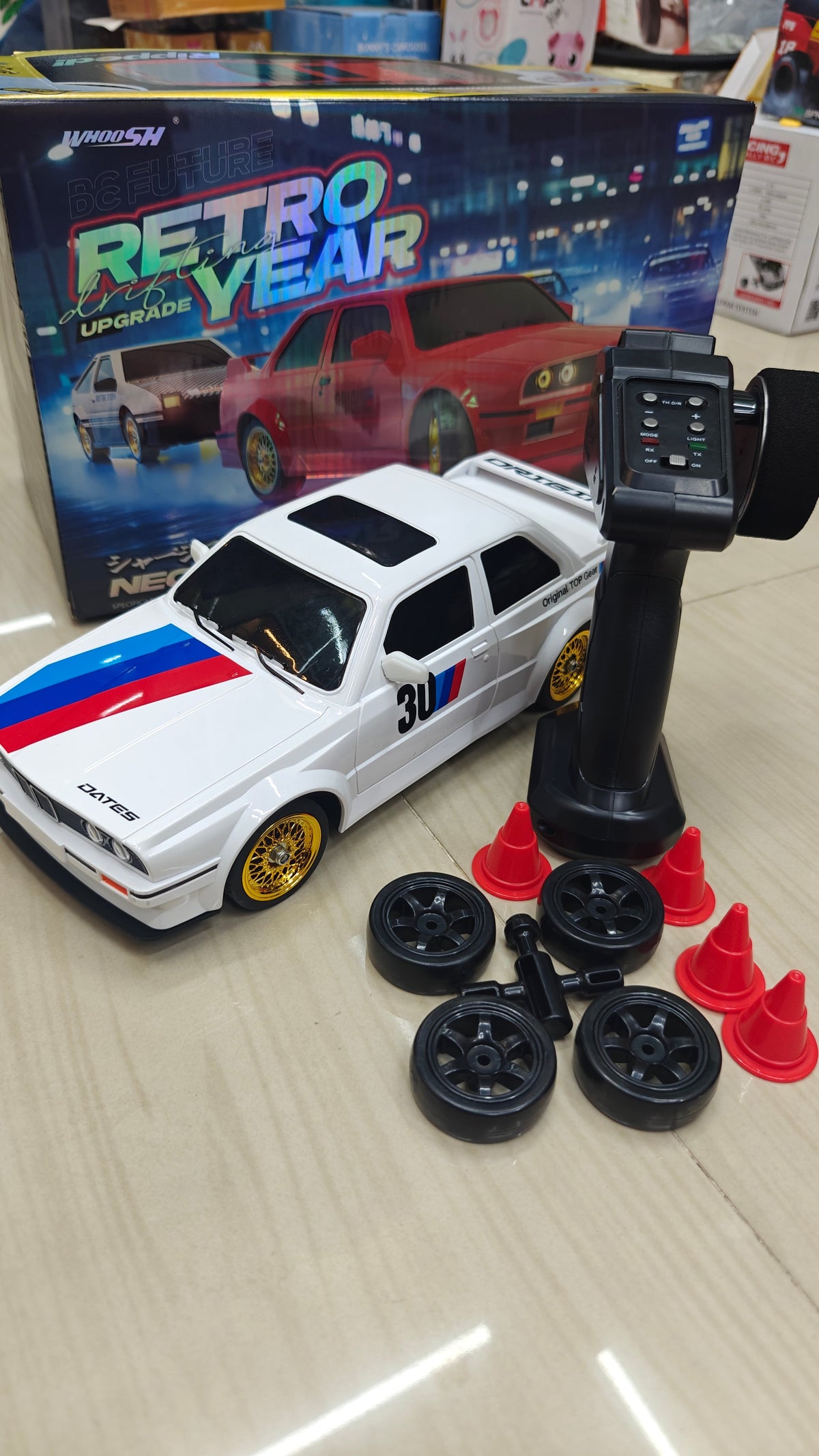 BMW DRIFT CAR 30KM HIGH SPEED E30 HOBBY GRADE M3 in white with remote control and cones for ages 8 and up from Sam's Toy World