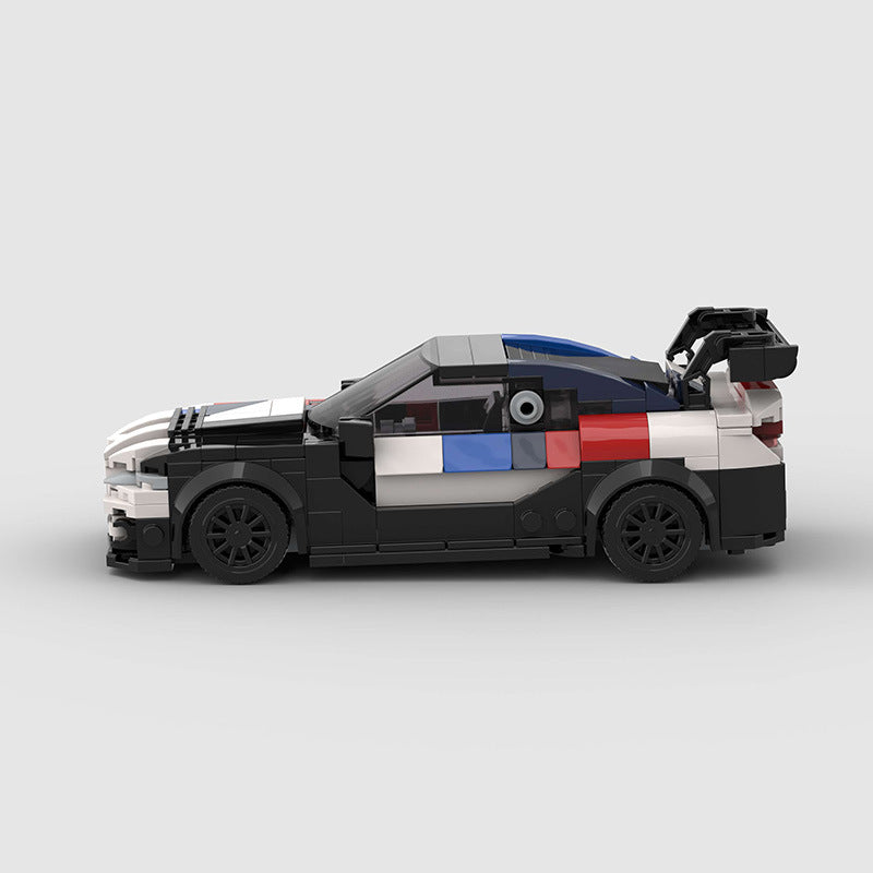 Black and white BMW M4 car toy at Sam's Toy World Ahmedabad, detailed side view for children aged 3 and up