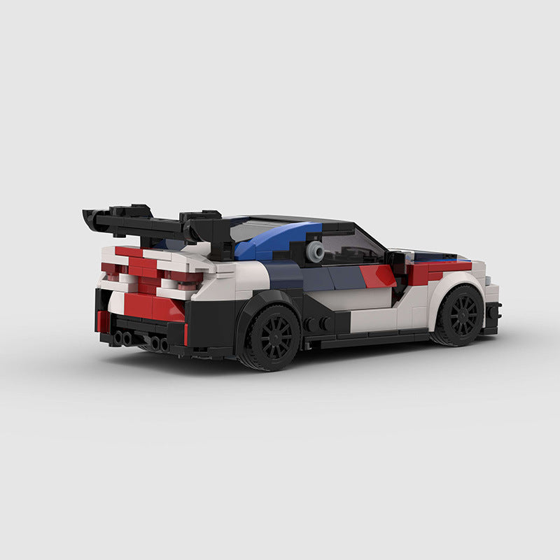 BMW M4 car toy in red and white, rear view, perfect for imaginative play at Sam's Toy World Ahmedabad