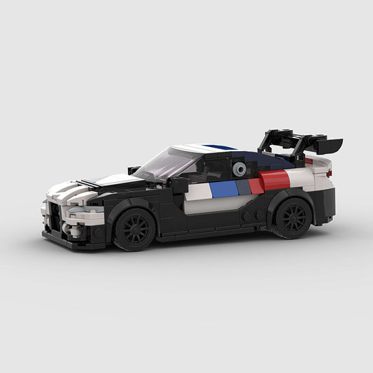 Black and white BMW M4 car toy, side view, perfect for imaginative play at Sam's Toy World Ahmedabad