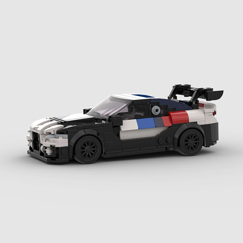 Black and white BMW M4 car toy, side view, perfect for imaginative play at Sam's Toy World Ahmedabad
