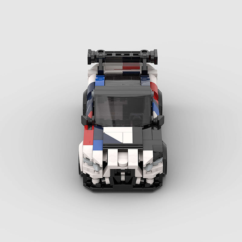 Top view of a BMW M4 car toy in black, white, and red colors at Sam's Toy World Ahmedabad