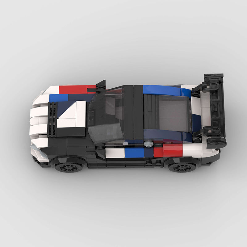 BMW M4 car toy in black, white, and blue design, top view, perfect for kids at Sam's Toy World Ahmedabad