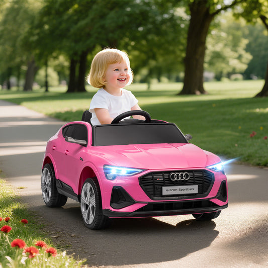 Pink Audi e-tron Sportback childs electric ride on car for girls, perfect for ages 3 to 6, from Sam's Toy World