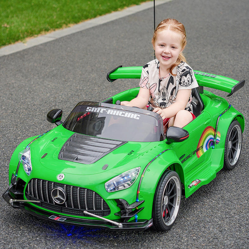 Green childs electric ride on car with sporty design for kids, front view, perfect for outdoor fun