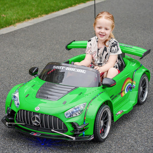 Green childs electric ride on car with sporty design for kids, front view, perfect for outdoor fun