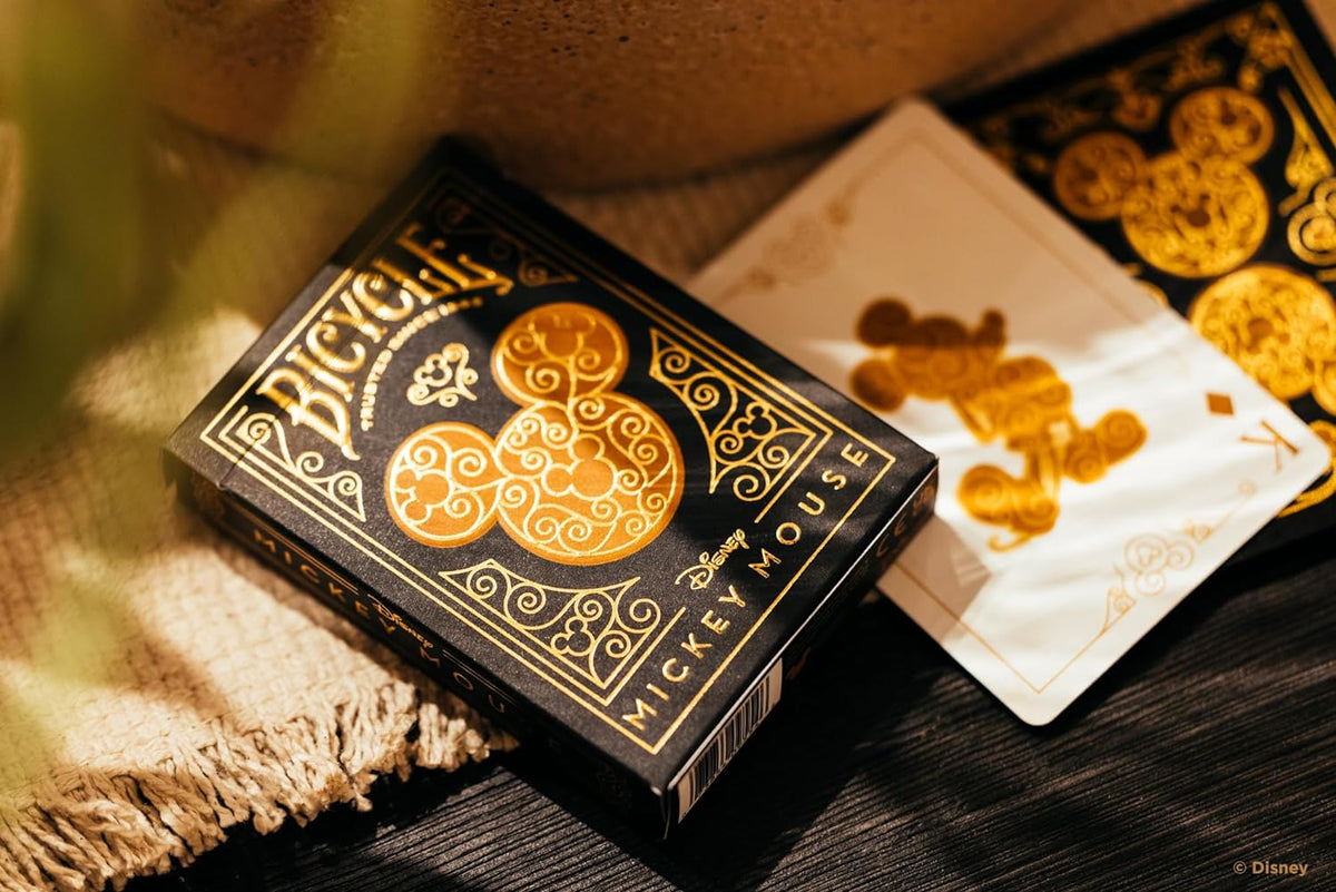 Mickey Mouse Playing Cards in a decorative black box, designed for fun and entertainment, side view