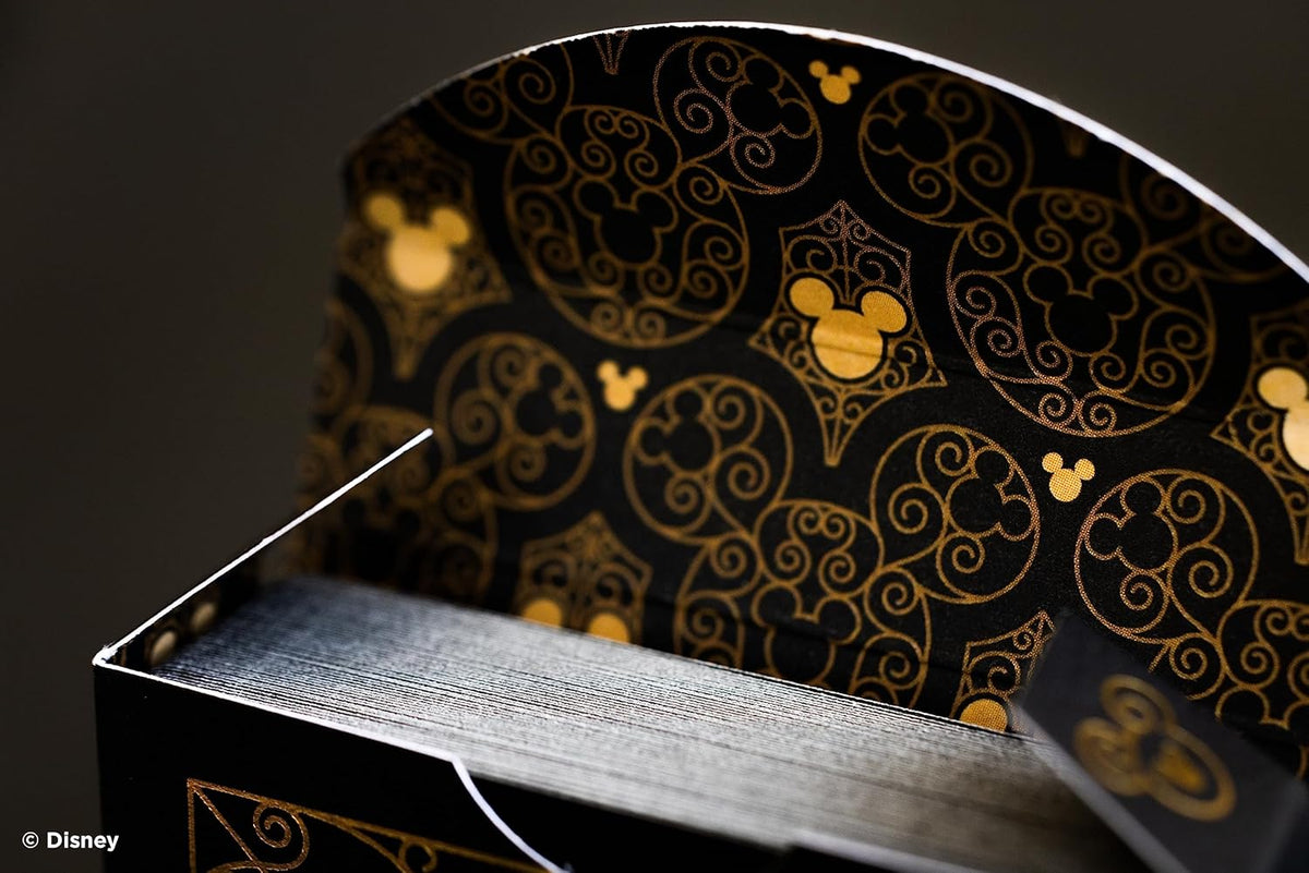 Black Mickey Mouse and Mickey Mouse Playing Cards box with intricate gold designs, top view for family game nights