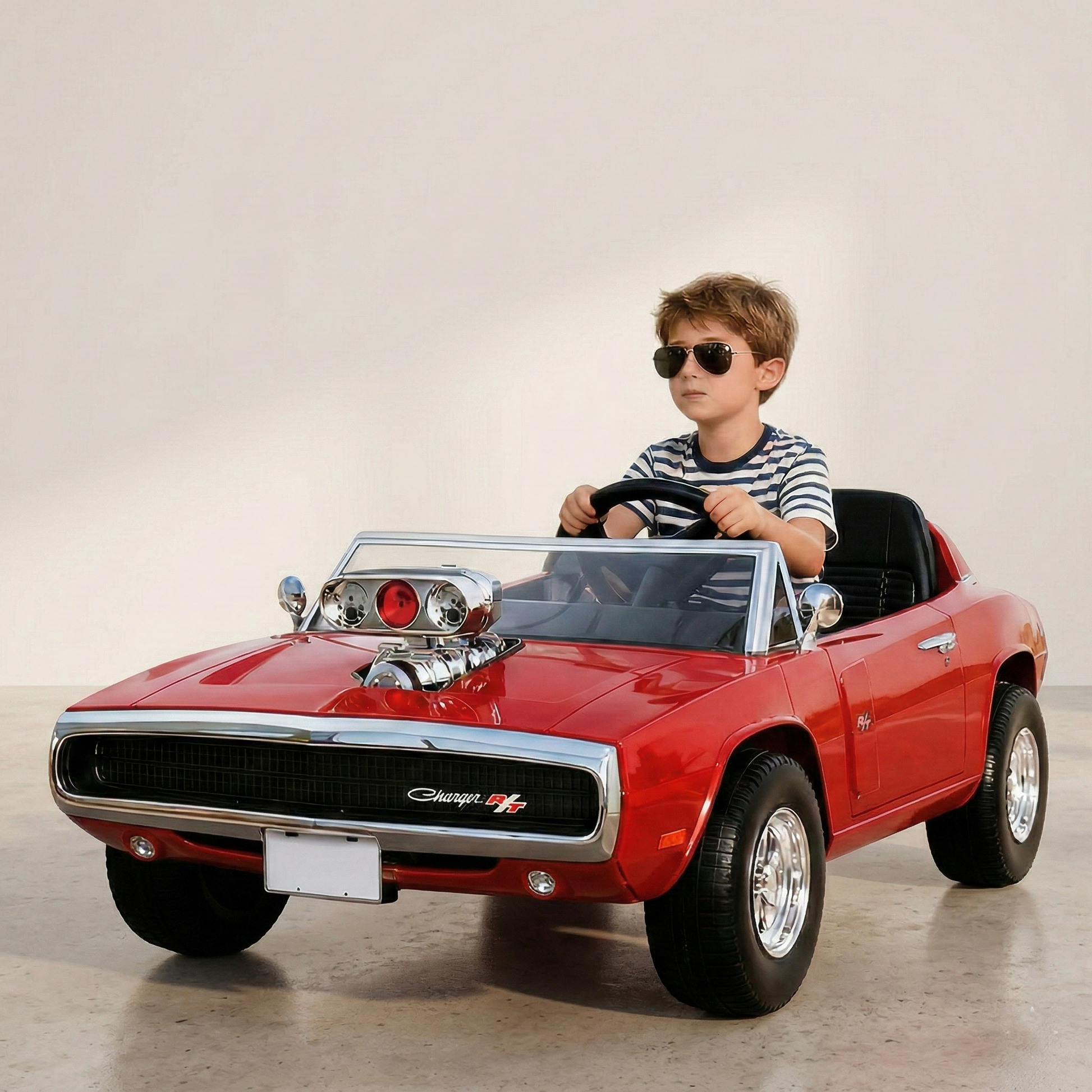 Red childs ride on electric car with chrome details, front view, perfect for kids to enjoy outdoor fun
