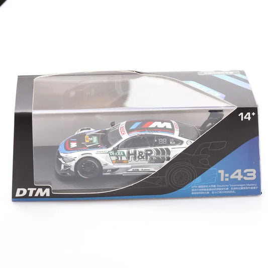 Diecast model of a Tesla Model 3 car in a clear display box, ideal for collectors and fans