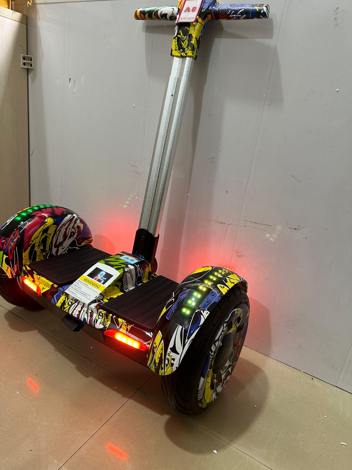 Colorful handle hoverboard for kids and adults Ahmedabad Gujarat India with LED lights and sturdy handles