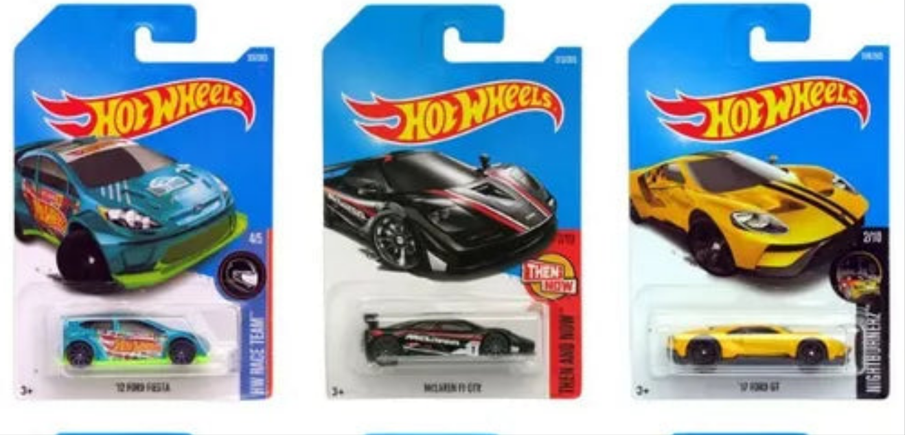 Three packaged Hot Wheels diecast cars 1:64 scale buy in Ahmedabad Gujarat . green black and yellow sports car models