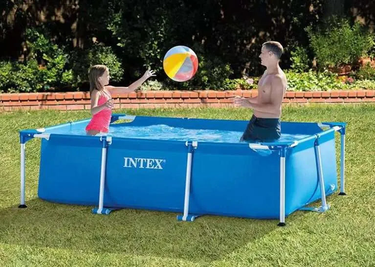 Intex 8.5ft inflatable swimming pool India large size in Ahmedabad Gujarat with children playing with a beach ball