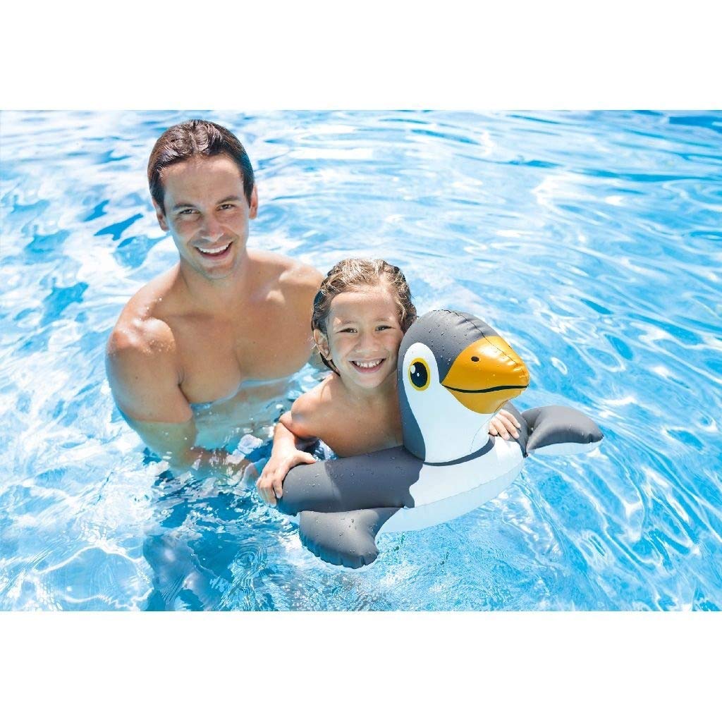 Intex children's swimming ring Ahmedabad at Sam's Toy World Shop, penguin design, in use in the pool with a smiling child.