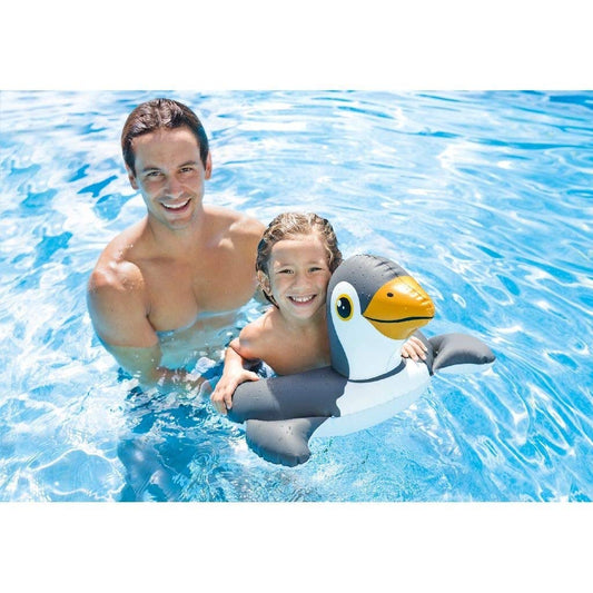 Intex children's swimming ring Ahmedabad at Sam's Toy World Shop, penguin design, in use in the pool with a smiling child.